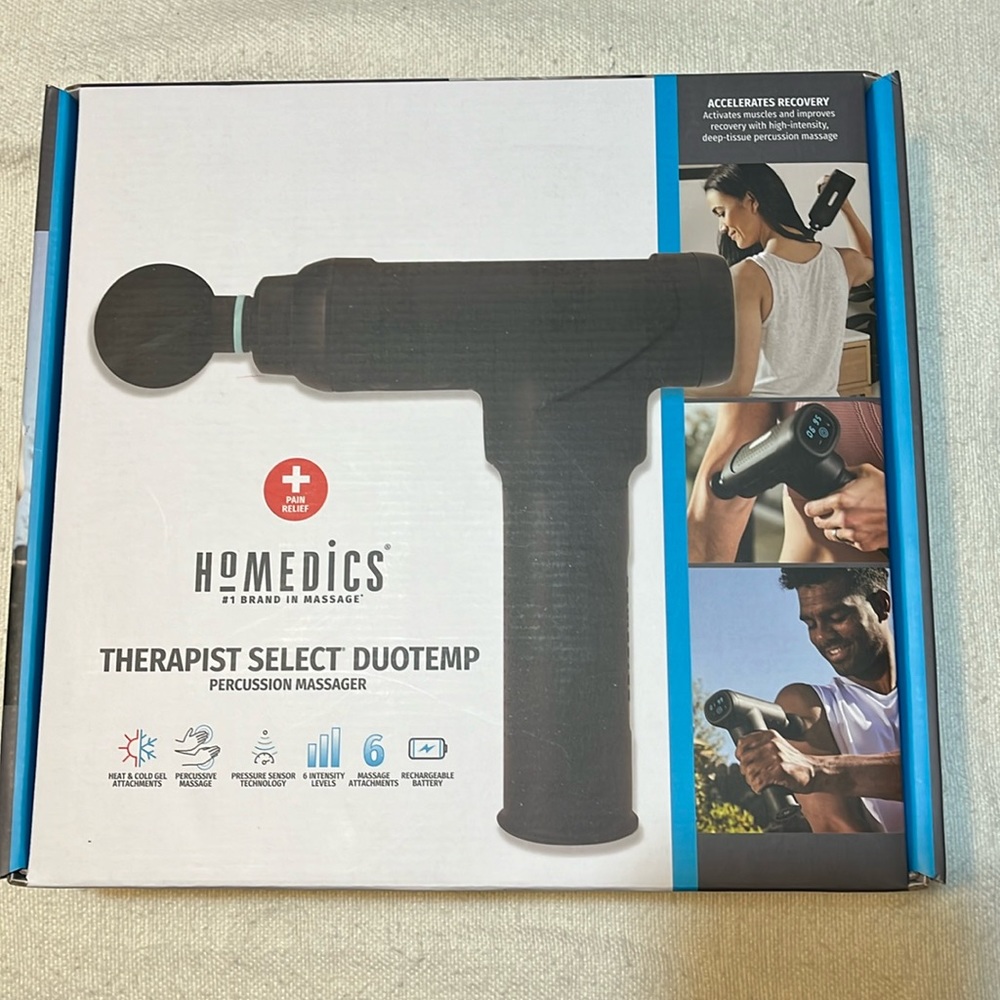 Homesick percussion massager.  Never used.